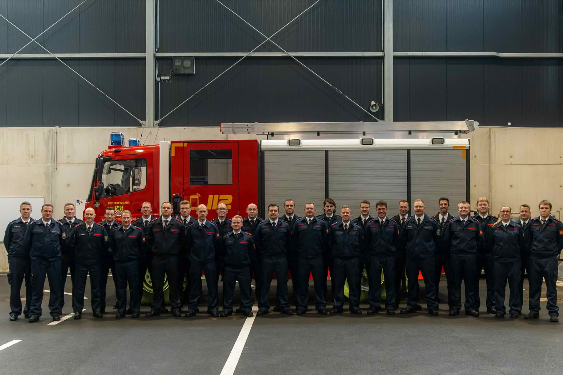 Gruppenfoto der 23 neue Brandmeister